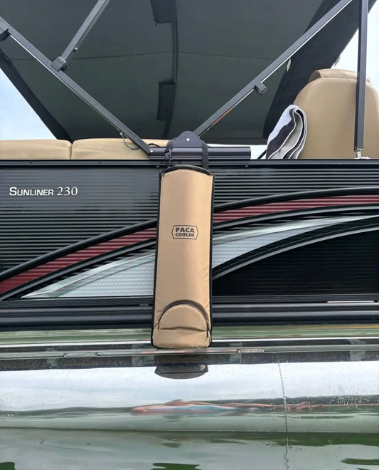 Tan Paca Cooler on a black pontoon boat. Photo credit Cletus T on TikTok.