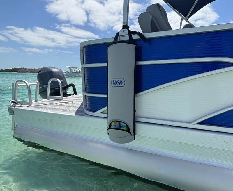 Silver Paca Cooler attached to a blue pontoon boat beached at Keewaydin Island in Florida near Marco Island, FL.
No need to get out of the water for your next beverage at the sandbar.